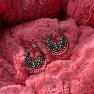 Silver colored earrings